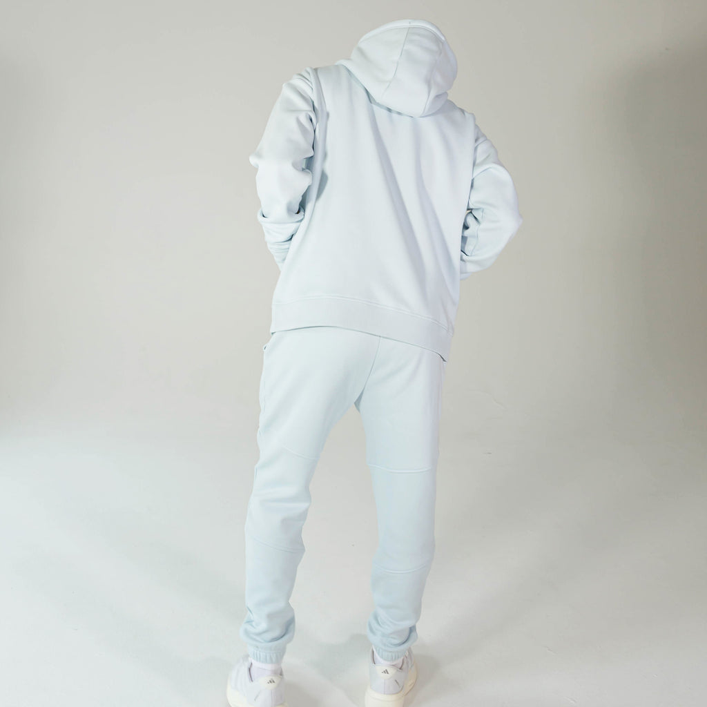 Adult model wearing Blue Baseline joggers
