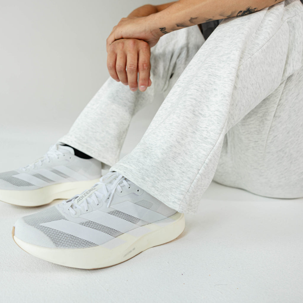 Adult model wearing Gray Baseline Straight Leg sweatpants