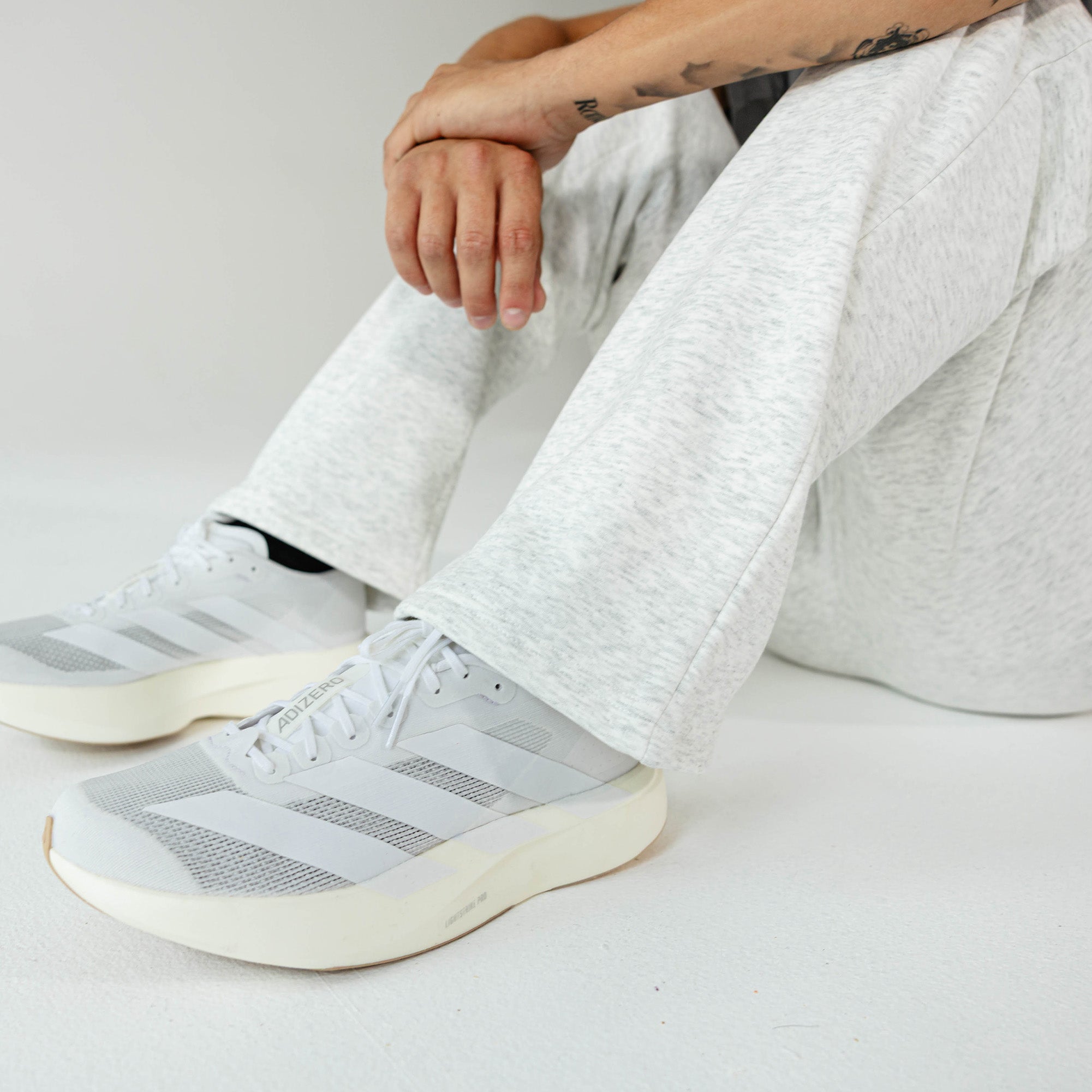 Adult model wearing Gray Baseline Straight Leg sweatpants