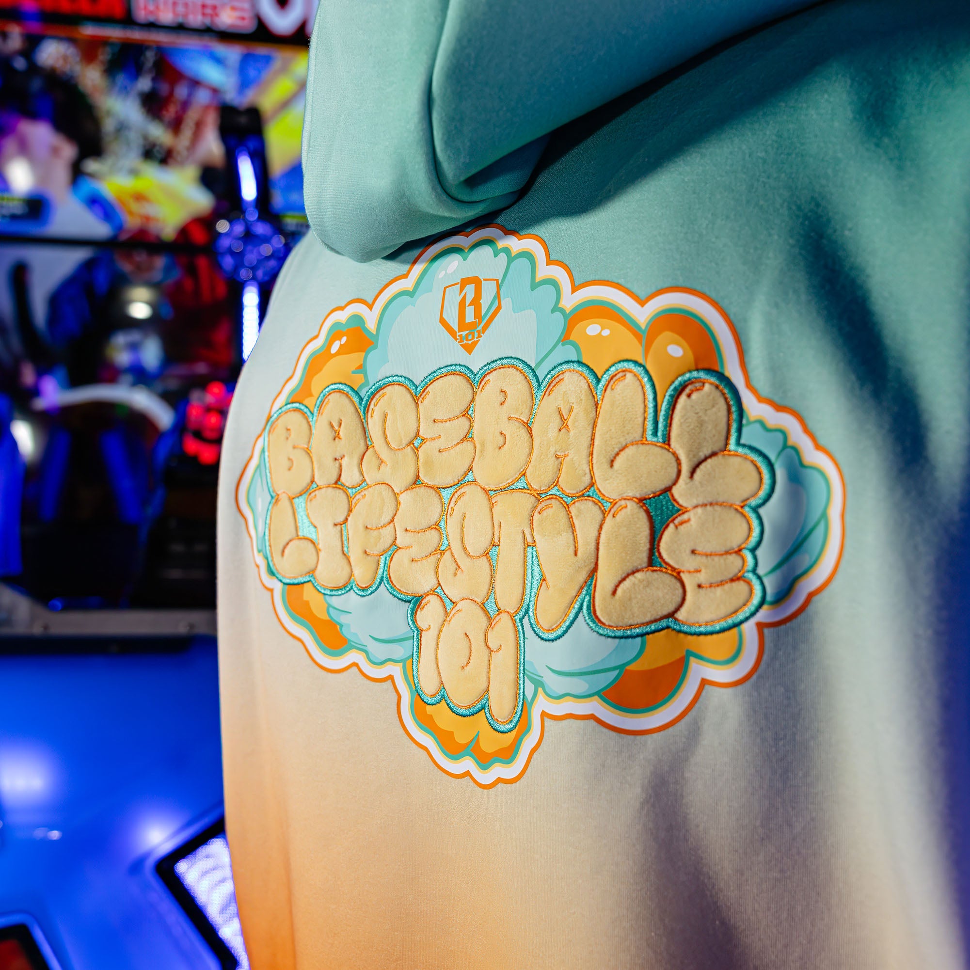 Adult model wearing Cotton Candy Tangerine Freeze hoodie