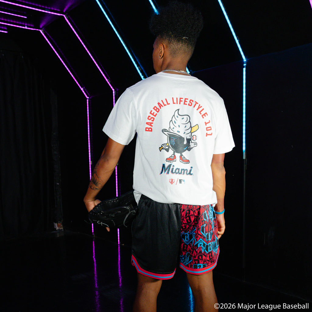 Adult model wearing black shorts with "Miami Marlins Sticker Court" design
