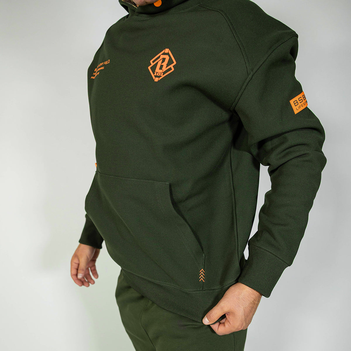 Adult model wearing green Realtree Legacy Off-Field Waffle Performance Camo hoodie