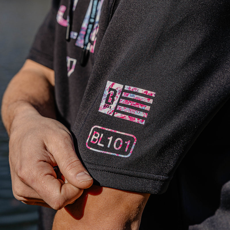Black short sleeve hoodie with pink and white BL101 logo on sleeve