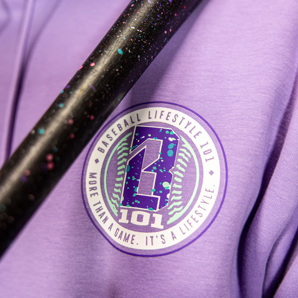 Purple hoodie with a 'Baseball Lifestyle 101' logo on a purple background