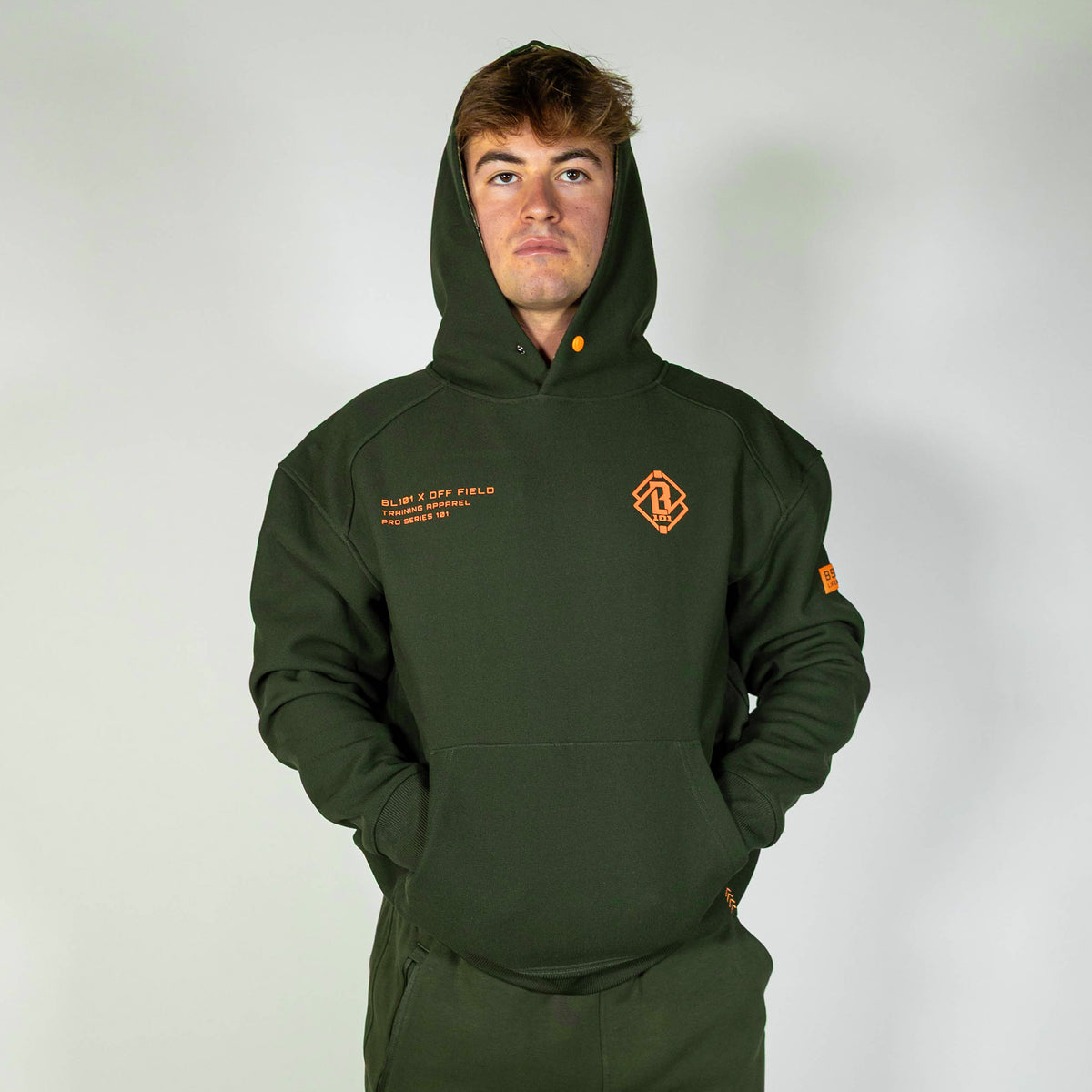 Adult model wearing green Realtree Legacy Off-Field Waffle Performance Camo hoodie