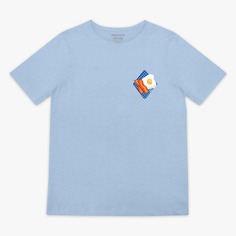 Light blue t-shirt with a graphic of an egg and bacon on a white background