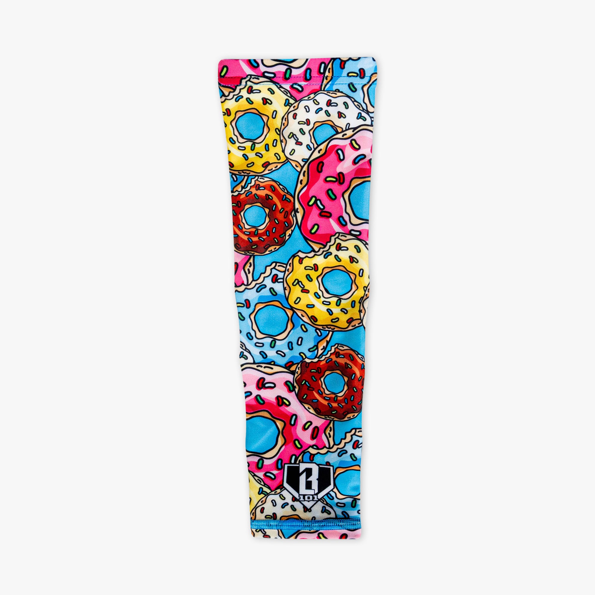 Donut arm sleeve laid flat on white background with colorful frosted donut and sprinkle print and BL101 logo patch at wrist