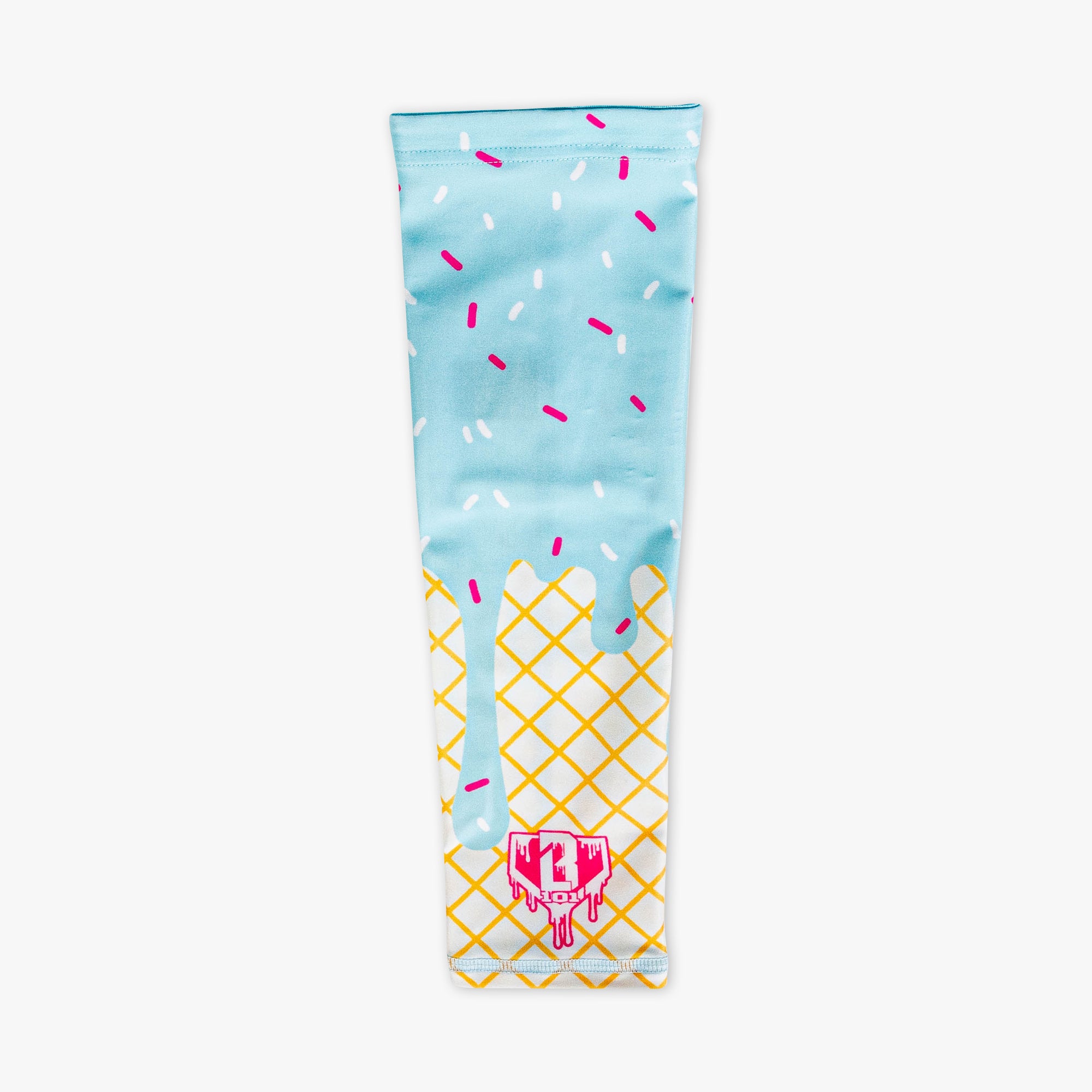 Ice cream arm sleeve laid flat on a white background featuring a light blue dripping frosting and pink and white sprinkle print over a waffle cone design with a BL101 logo near the wrist