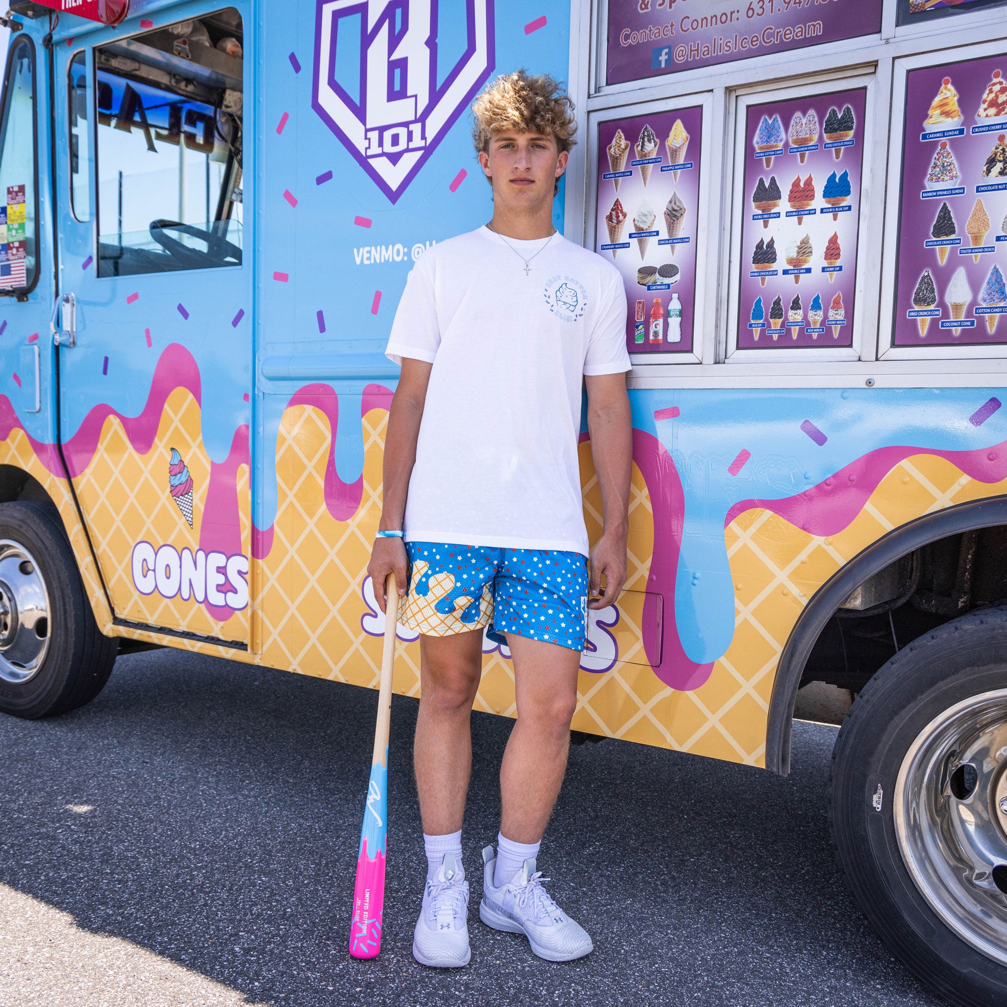 Adult model wearing white graphic tee with “Best Batter” design
