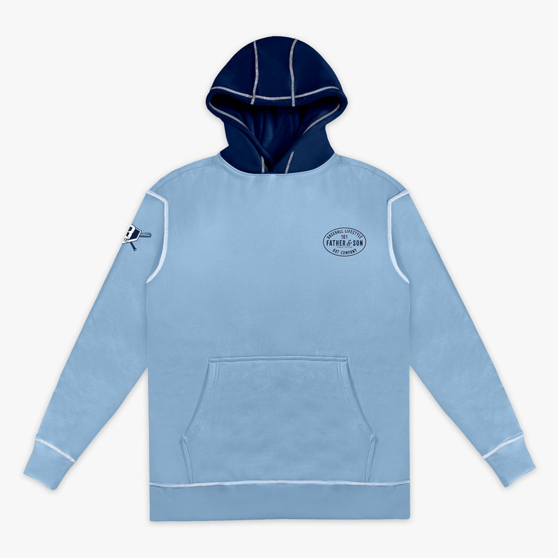 Flat lay front view of the adult columbia blue BL101 Bat Co Hoodie showing the Father & Son Bat Company chest stamp, BL101 sleeve logo, navy contrast hood, and kangaroo pocket.