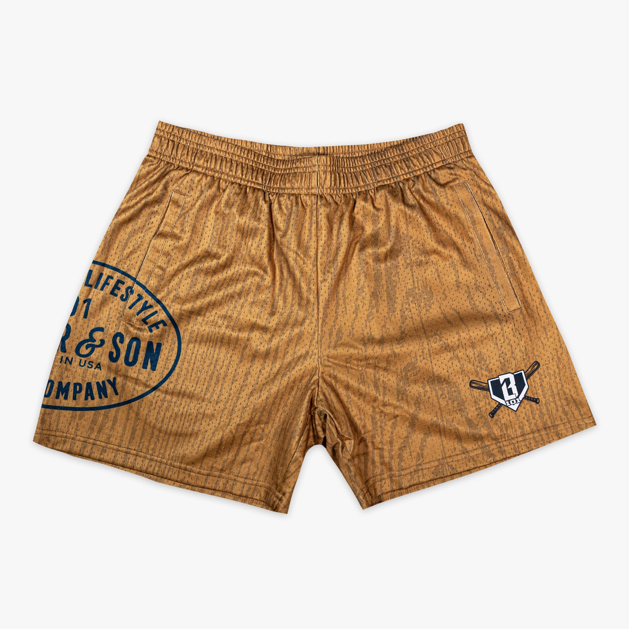 Flat lay front view of the BL101 Bat Co Shorts in brown wood grain mesh with Father & Son Bat Company oval stamp on the left leg and BL101 crossed bats logo on the right.