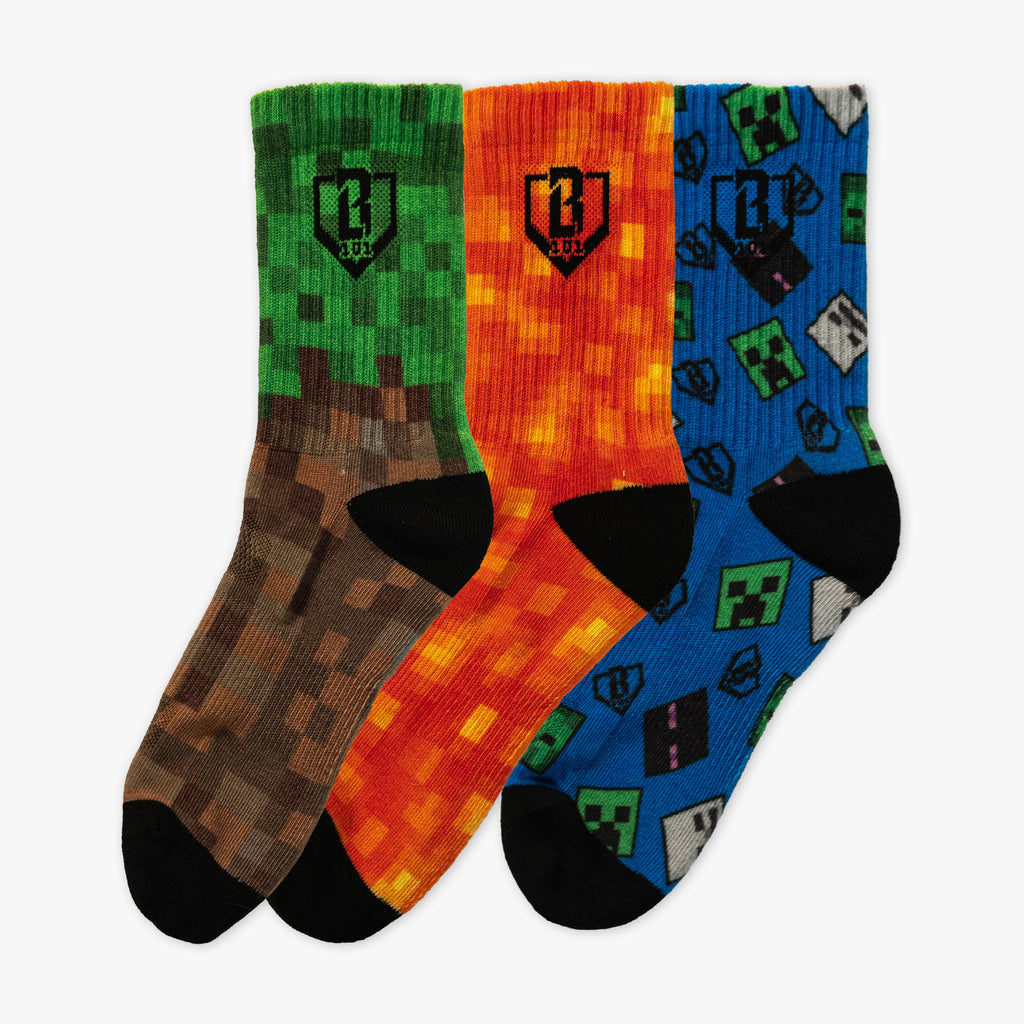 Adult model wearing multi-color socks with "BL101 X Minecraft Performance 3-Pack" design