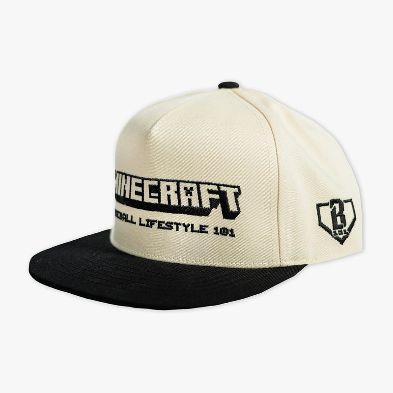 Adult model wearing black and white hat with "BL101 x Minecraft Sword" design