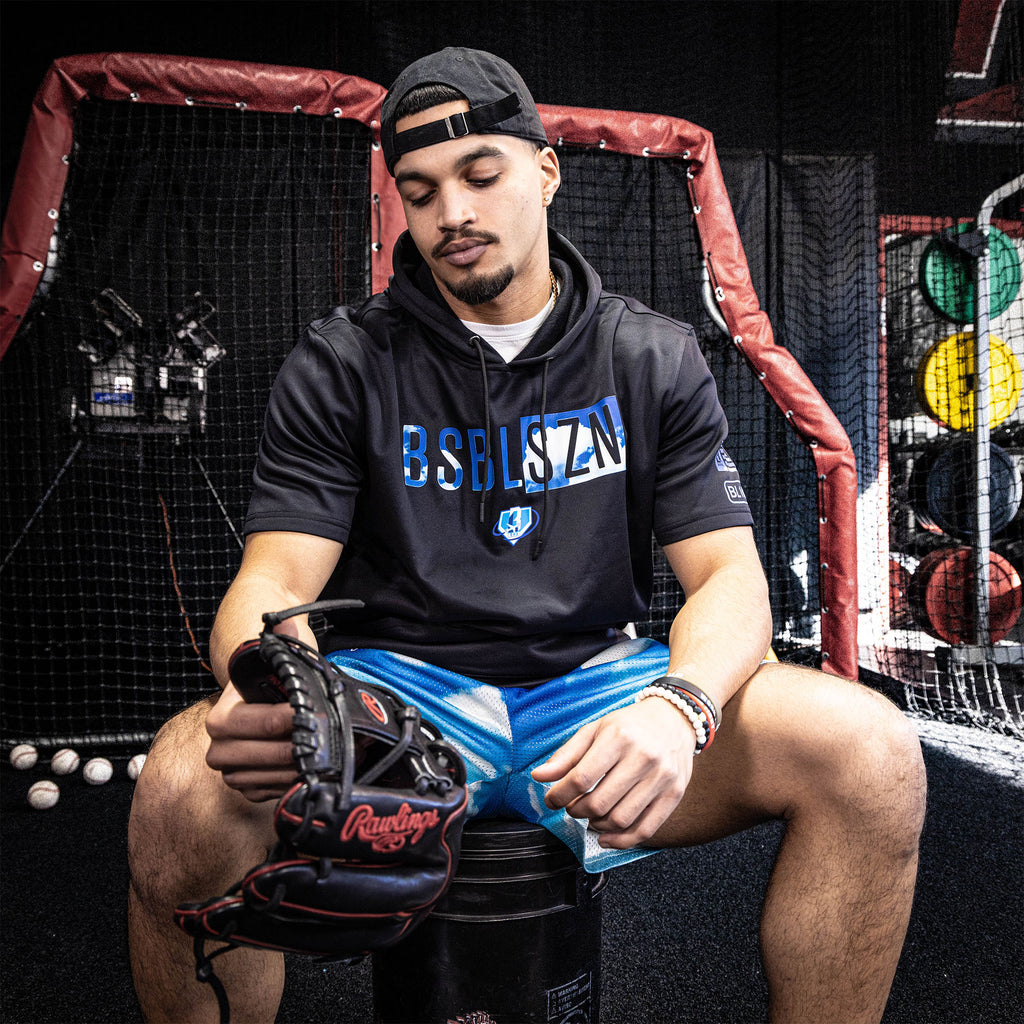 Adult model wearing blue BSBL-SZN Dream Chaser short sleeve hoodie