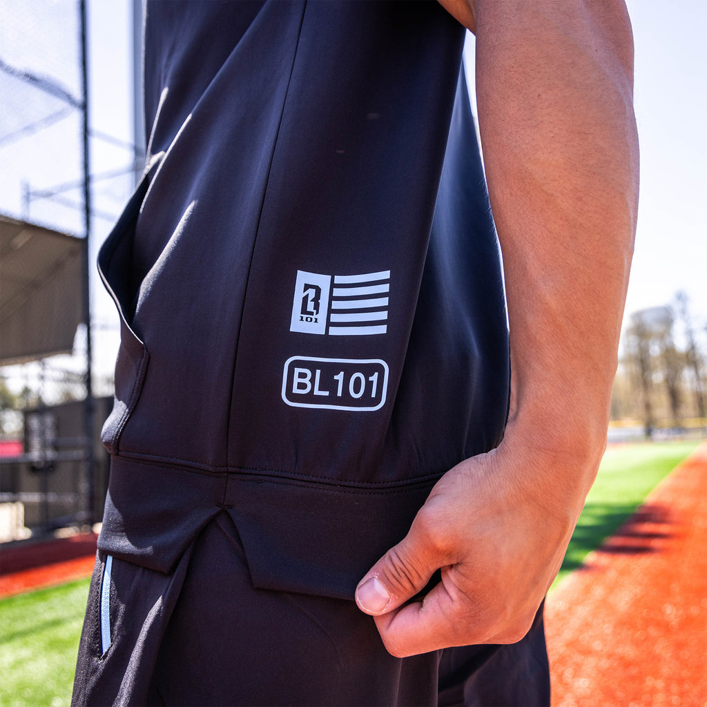 Adult model wearing black and light blue BSBL-SZN Sleeveless hoodie