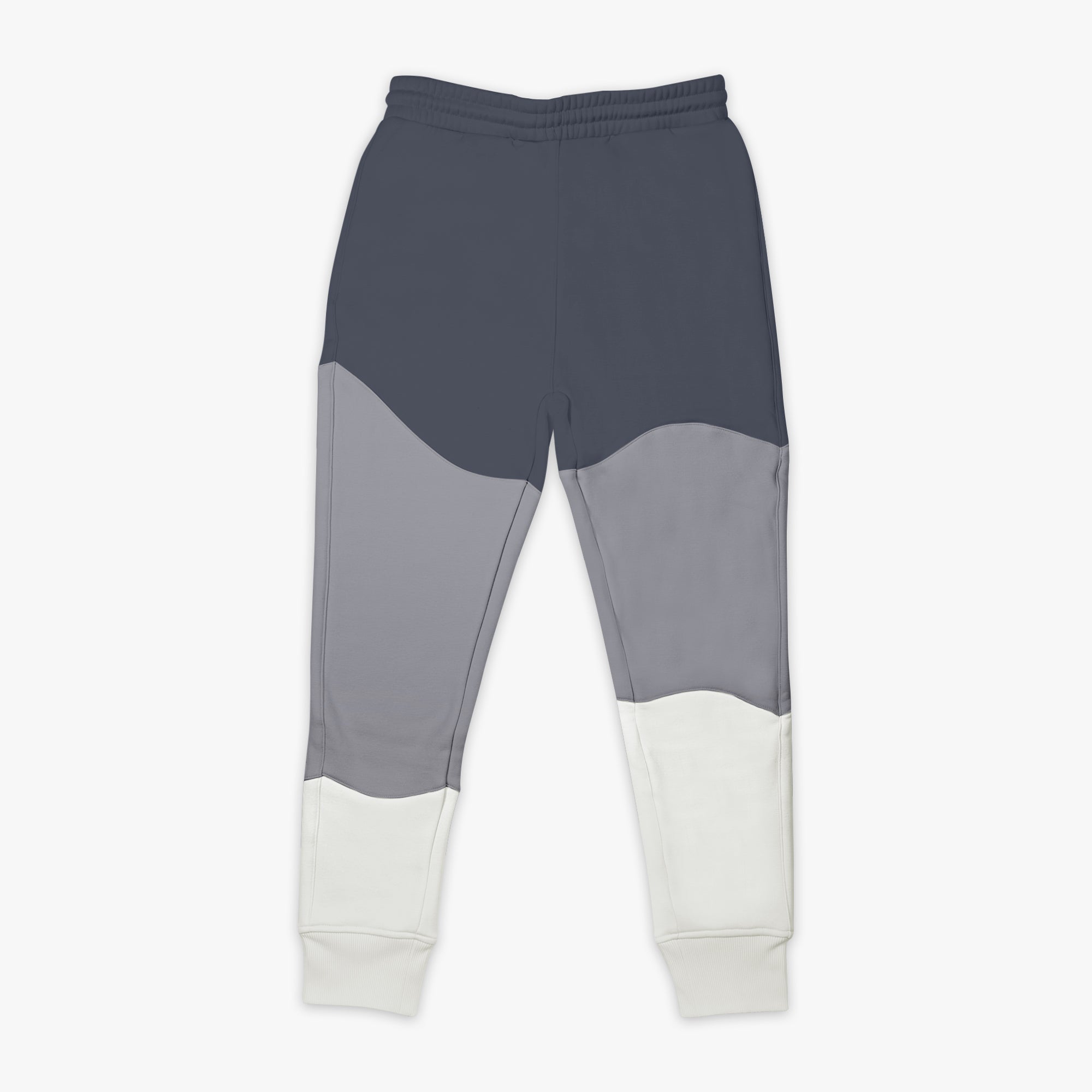 Gray and white color-blocked pants on a white background