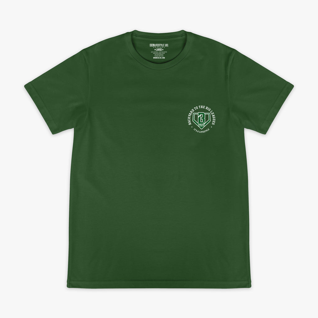 Front flat lay of the BL101 Backyard to the Big Leagues forest green tee, showing the BL101 logo on a white background.