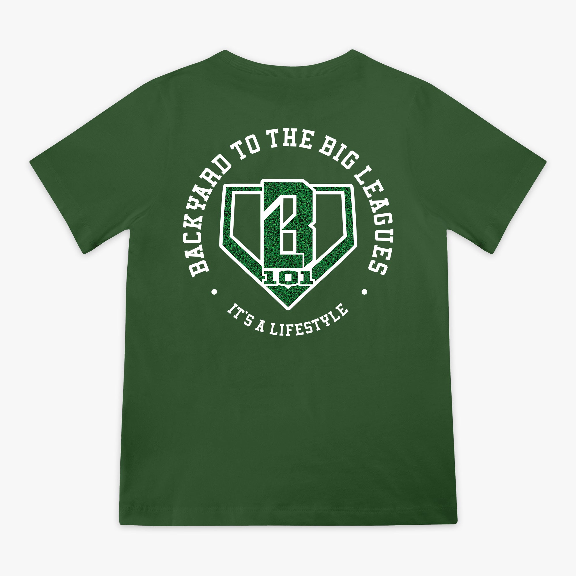 Back flat lay of the BL101 Backyard to the Big Leagues forest green tee, featuring a circular "It's a Lifestyle" graphic with a grass-textured BL101 logo on a white background