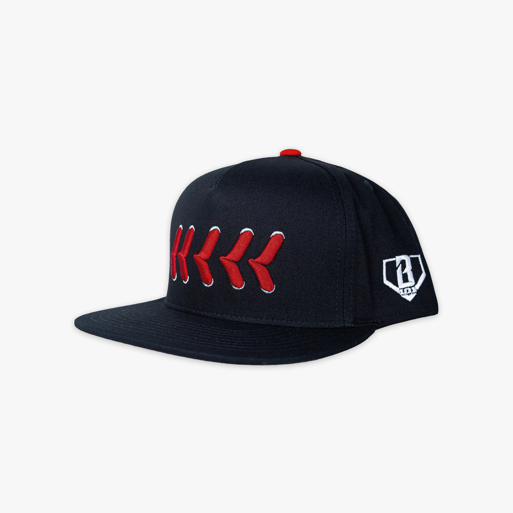 Black cap with red and white design on a white background