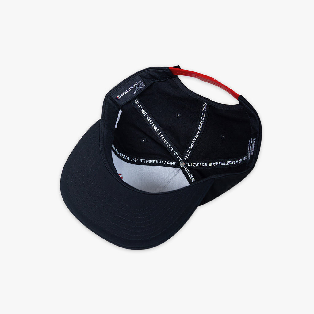 Black cap with white text on a white background