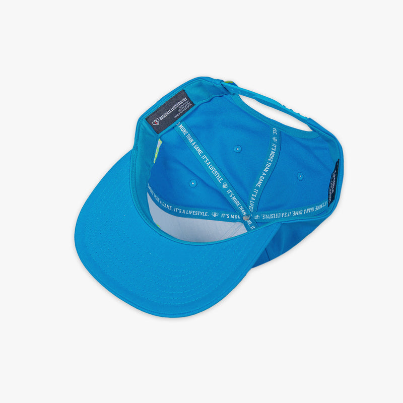 Blue cap with 'Baseball Lifestyle 101' tag on a white background