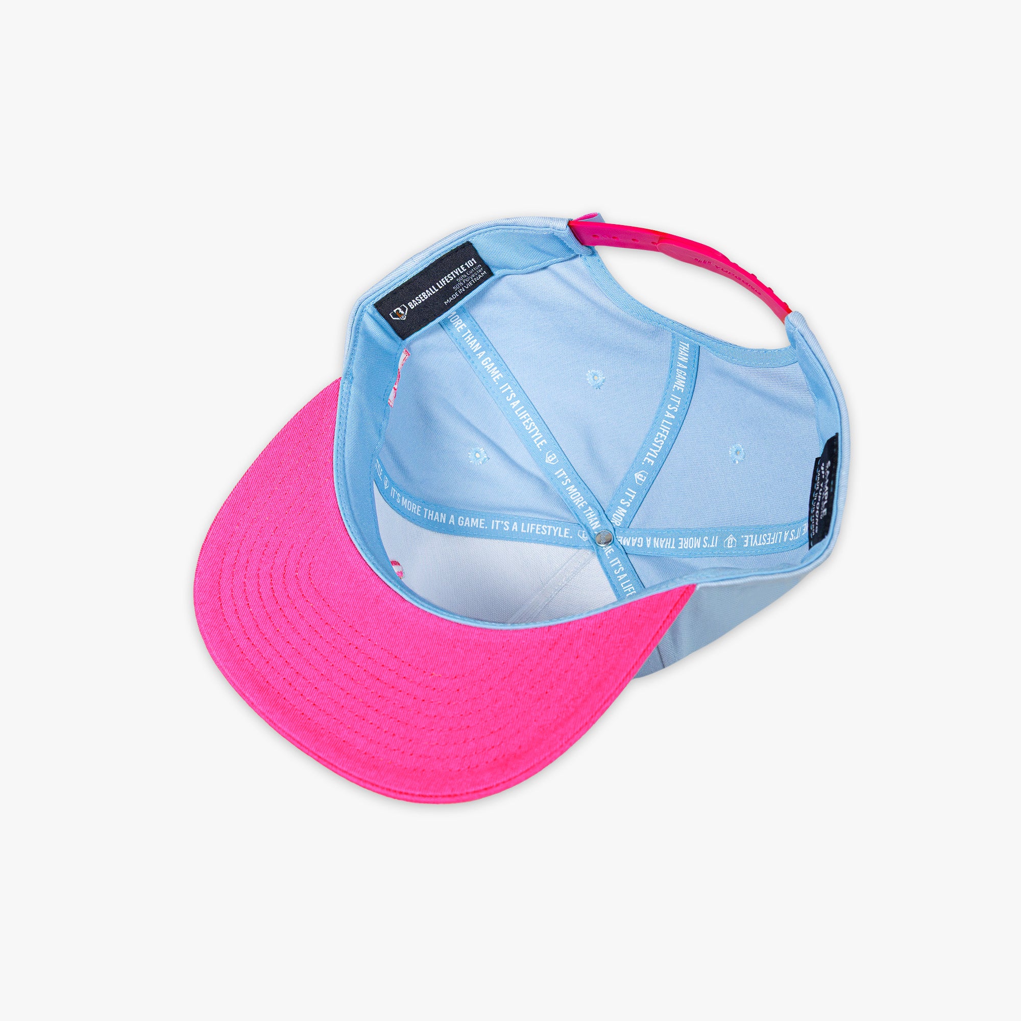 Two-tone pink and blue cap on a white background