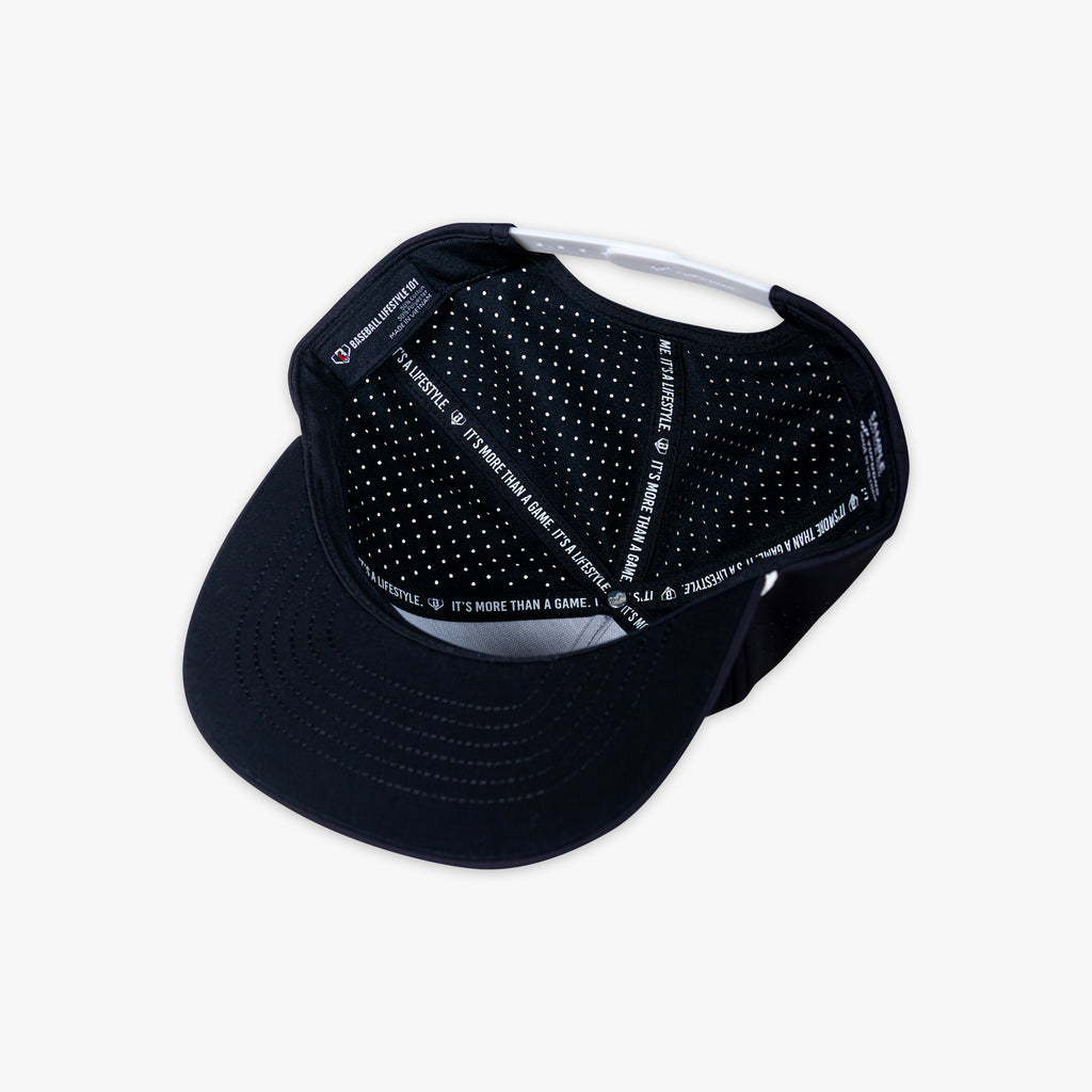 Black and white cap with BL101 tag on a white background