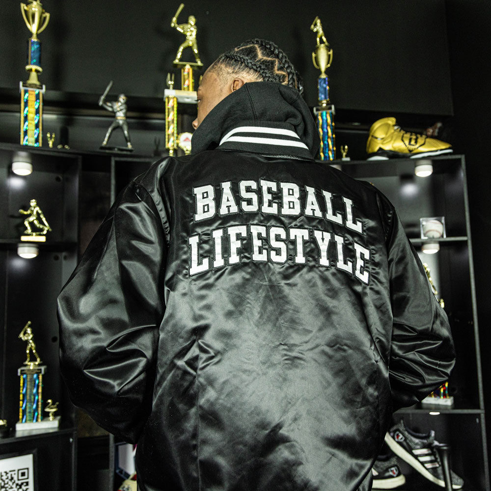 Jacket with “Baseline Satin Jacket” design — back view