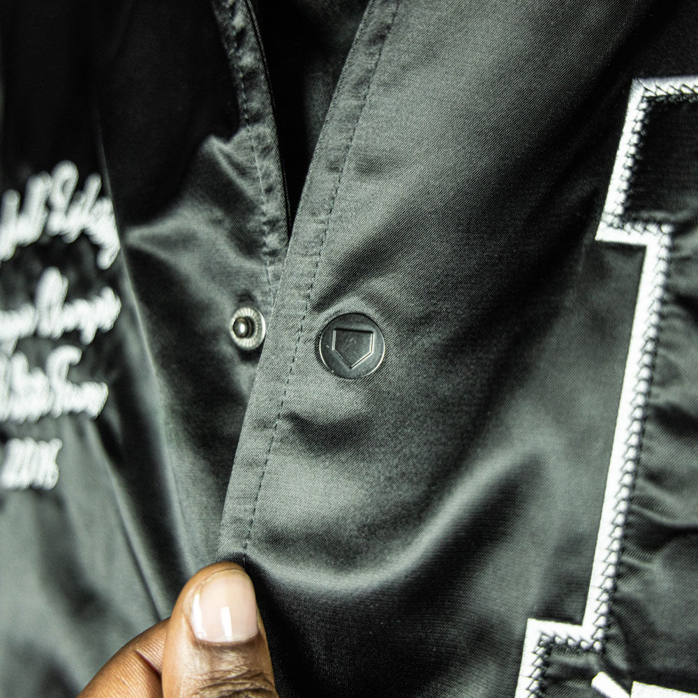 Jacket with “Baseline Satin Jacket” design — front view