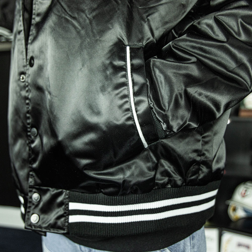 Jacket with “Baseline Satin Jacket” design — front view