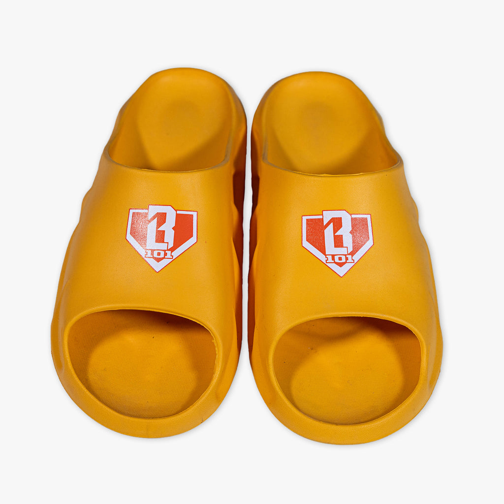 Pair of orange slides with a BL101 logo on a white background
