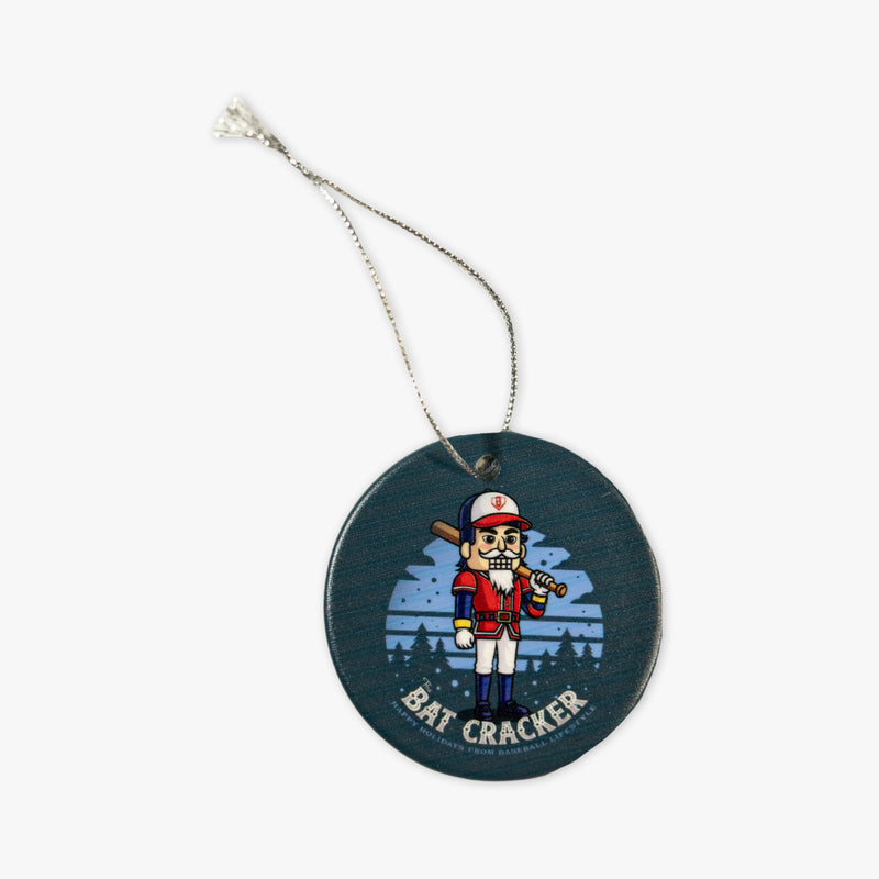 Teal ornament with "Bat Cracker Ornament" design