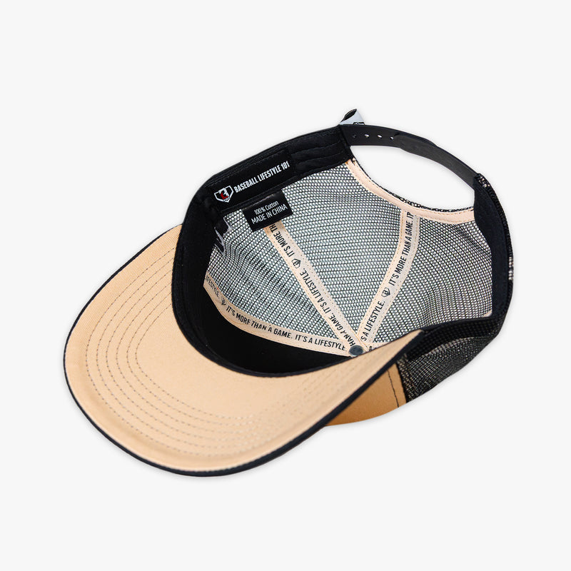 Beige and black cap with mesh back on a white background