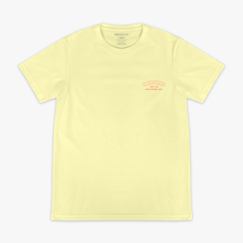Yellow graphic tee with "Bleachers Surf Club" design — front view