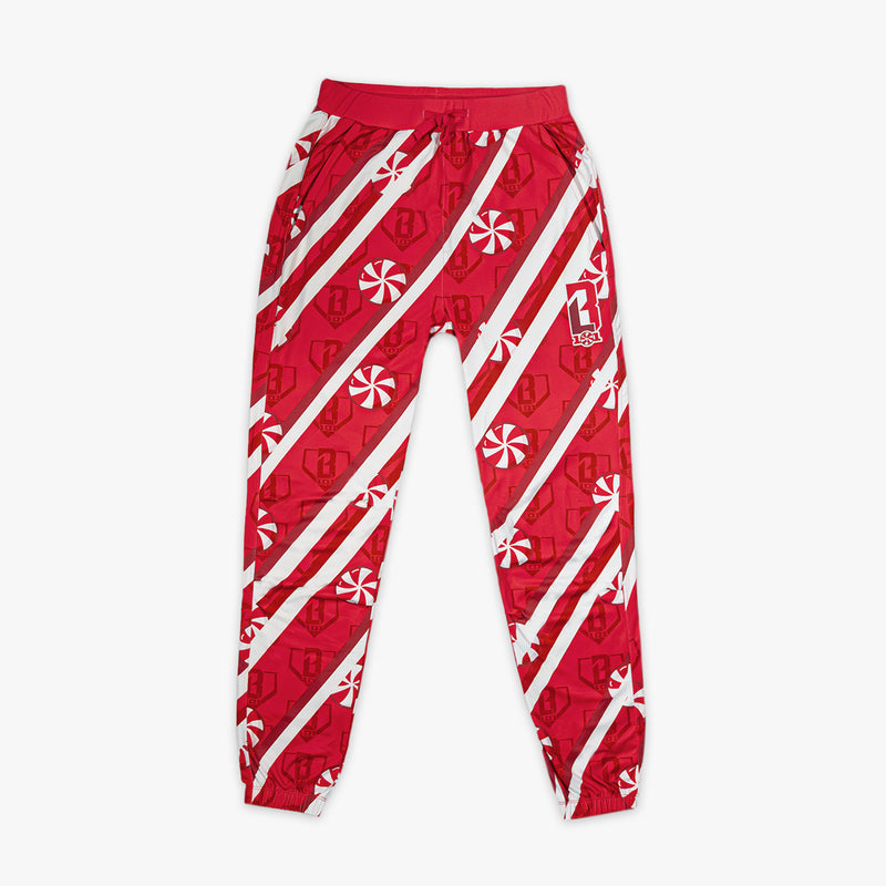 Red youth pants with “Candy Cane Pajama Pants” design — front view