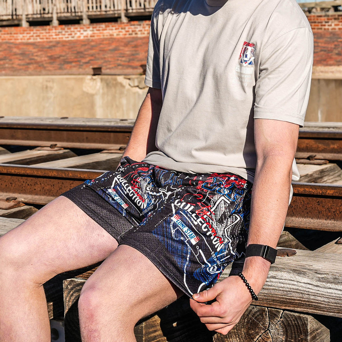 Adult model wearing city DAL shorts