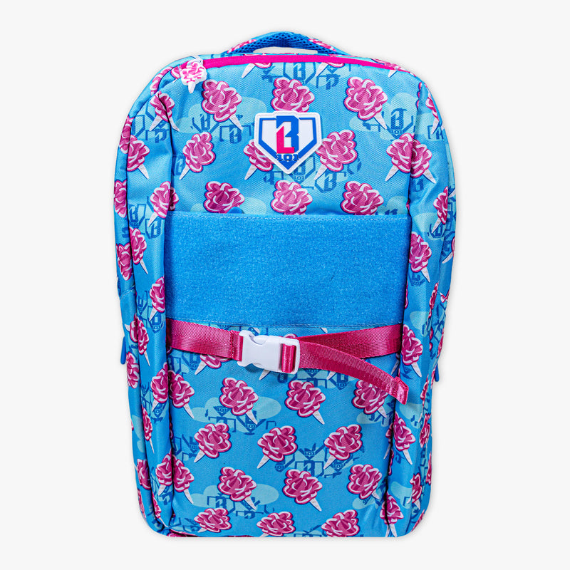Adult model wearing multi-color backpack with "Cotton Candy SZN 2" design