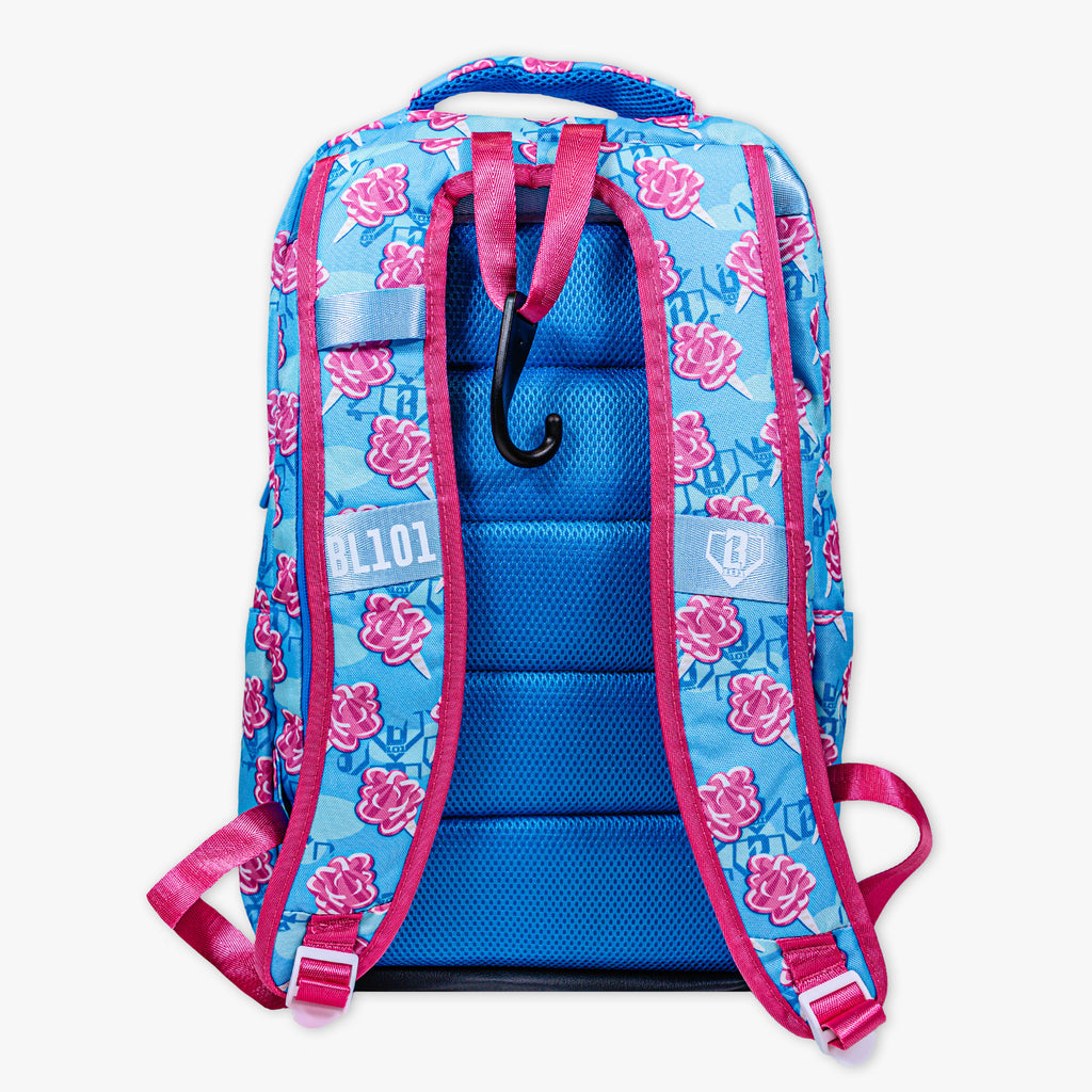 Adult model wearing multi-color backpack with "Cotton Candy SZN 2" design