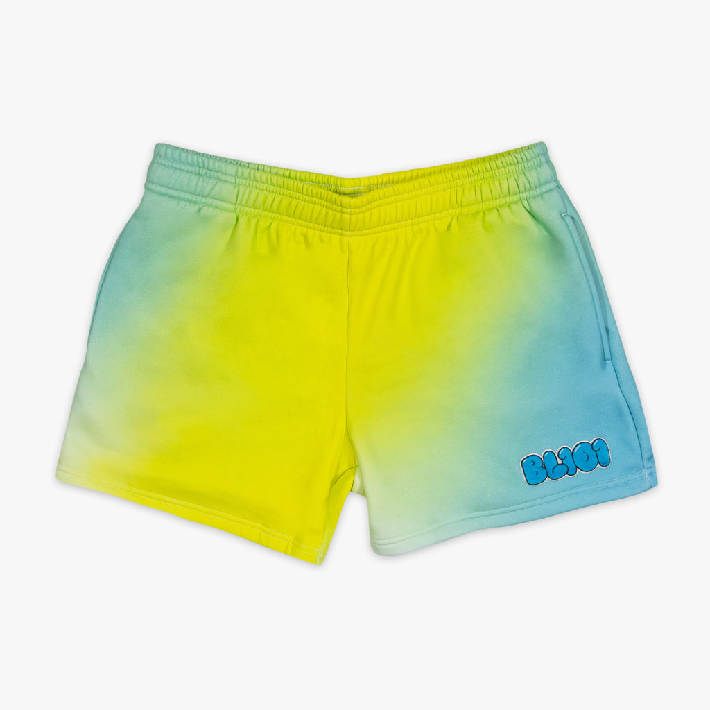 Gradient shorts transitioning from yellow to blue with 'BL101' branding on a white background