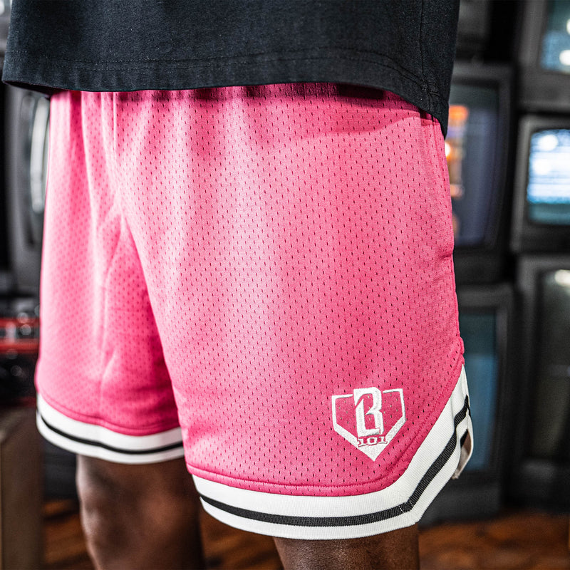 Adult model wearing red Court Azalea shorts