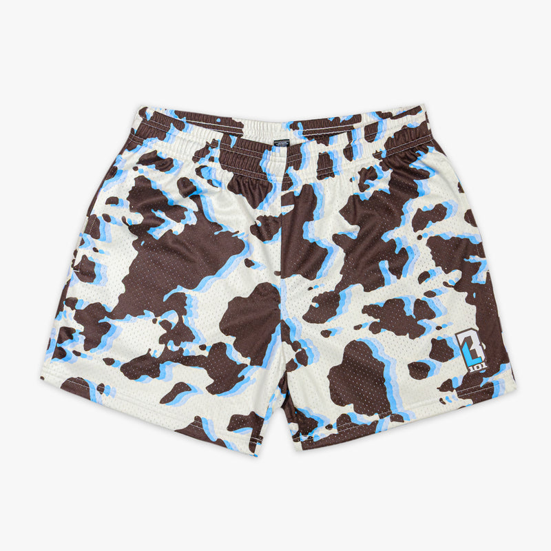 Cow print shorts with brown, black, and blue color way on a white background