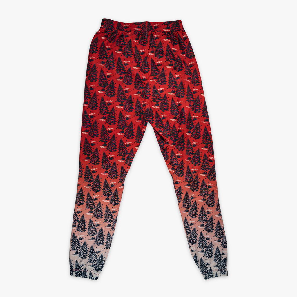 Red pajama pants with "Deck The Halls" design — back view
