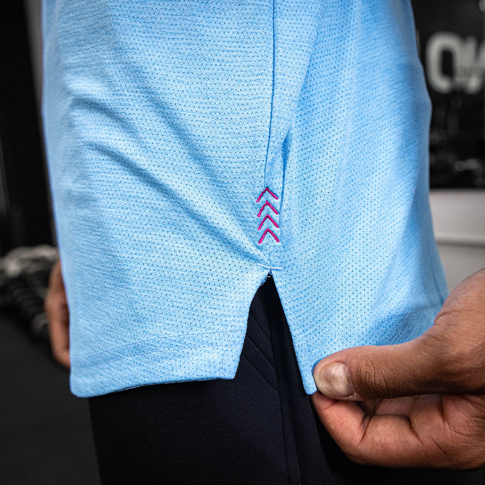 Adult model wearing blue Diamond Tech Long Sleeve Cotton Candy Blue long sleeve tee