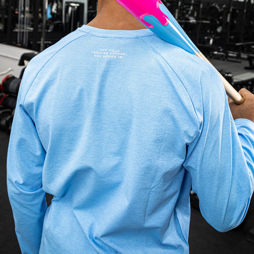 Adult model wearing blue Diamond Tech Long Sleeve Cotton Candy Blue long sleeve tee