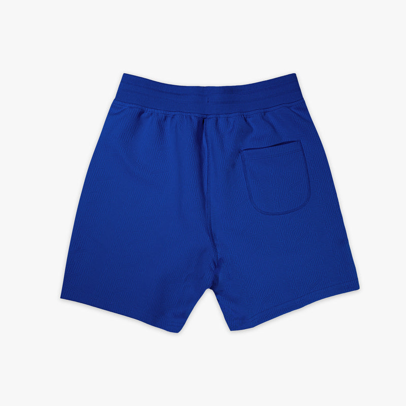 Black shorts with a small logo on a white background