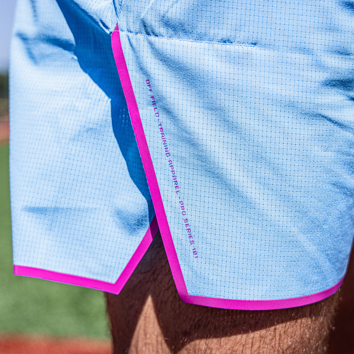 Adult model wearing blue Diamond Tech with Liner Cotton Candy shorts