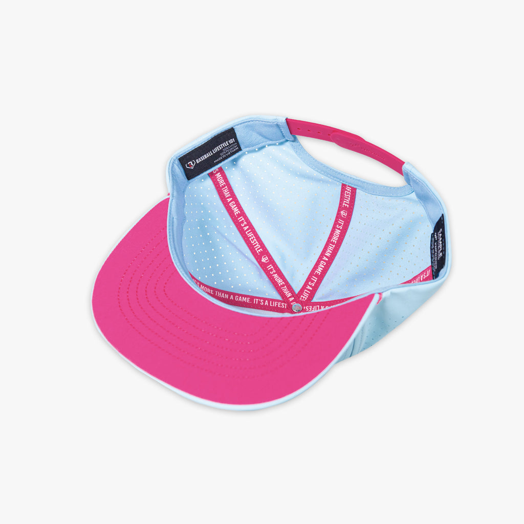 Pink and light blue visor with Baseball Lifestyle 101 tag