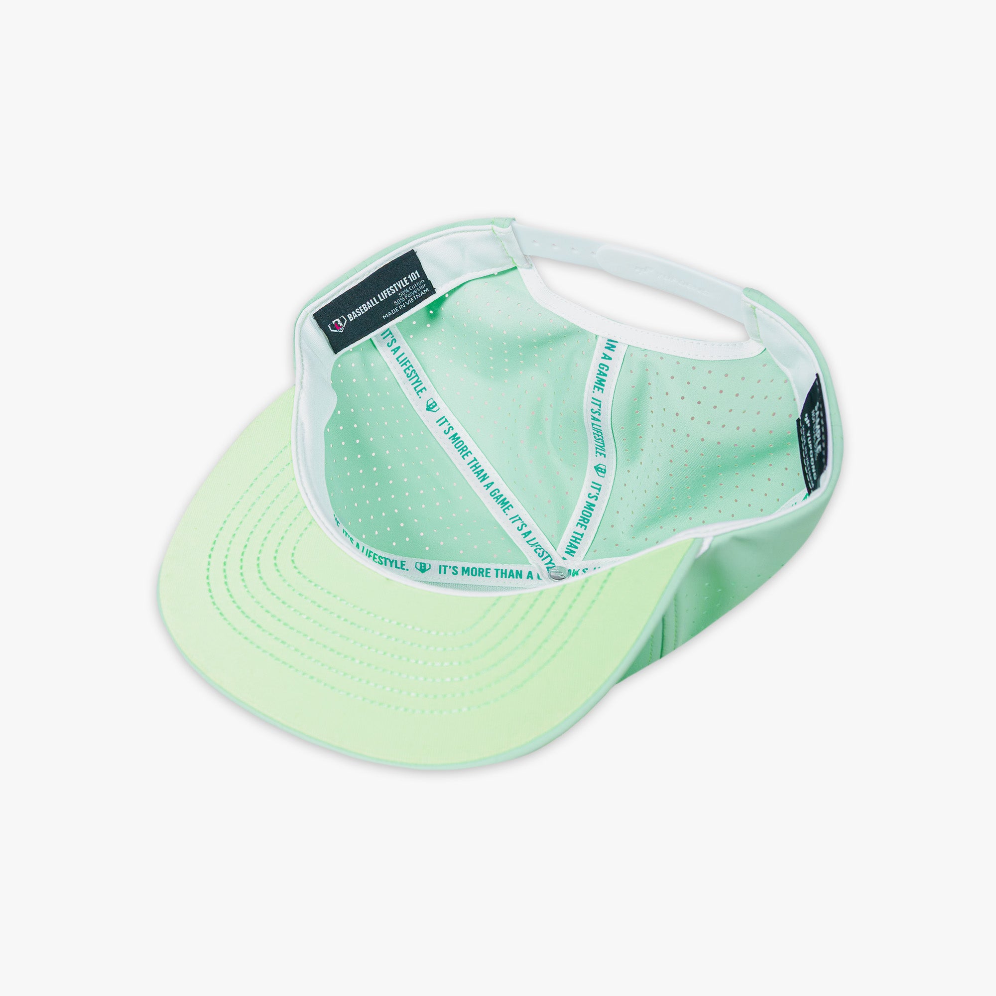 Light green visor cap with white Baseball Lifestyle 101 tag on a white background