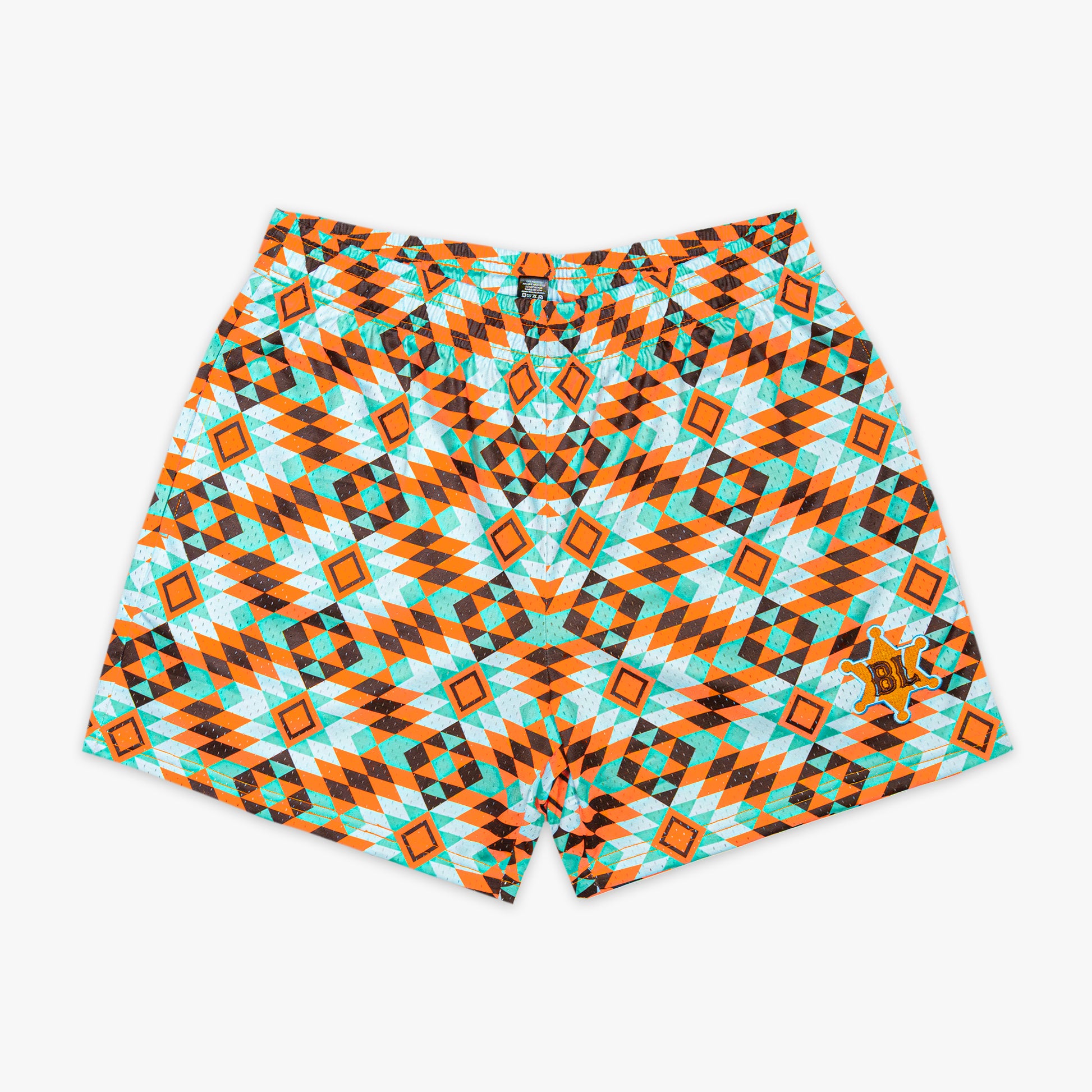Colorful geometric patterned shorts on a white background