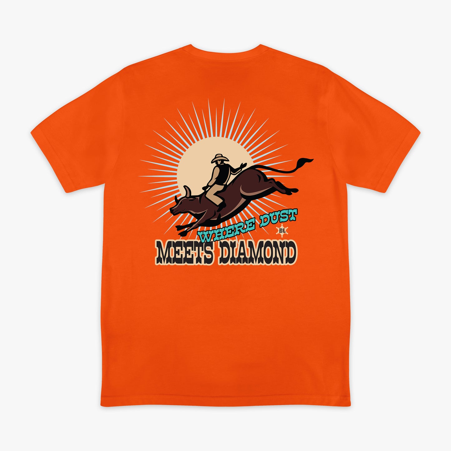Orange t-shirt with a graphic of a person riding a bucking bronco and 'Where Dust Meets Diamond' text on a white background